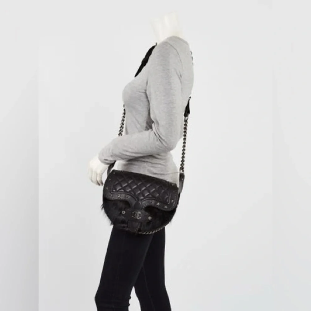 CHANEL Black Quilted & Fur Star-Studded Saddle Bag